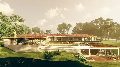 La Casa B6 se construyó en un claro rodeado de bosque autóctono, diseñada para integrarse a la perfección con la frondosa arboleda. Ubicada en la parte más alta de la parcela, se abre completamente a la vista de un valle impresionante
